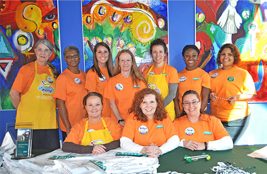 Group of Amica employees volunteering at a community event.