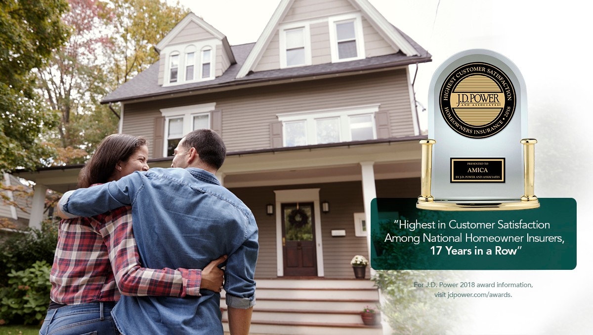 Young couple embracing outside their home: Amica awarded J.D. Power's Highest Customer Satisfaction Among National Homeowner Insurers, 17 Years in a Row