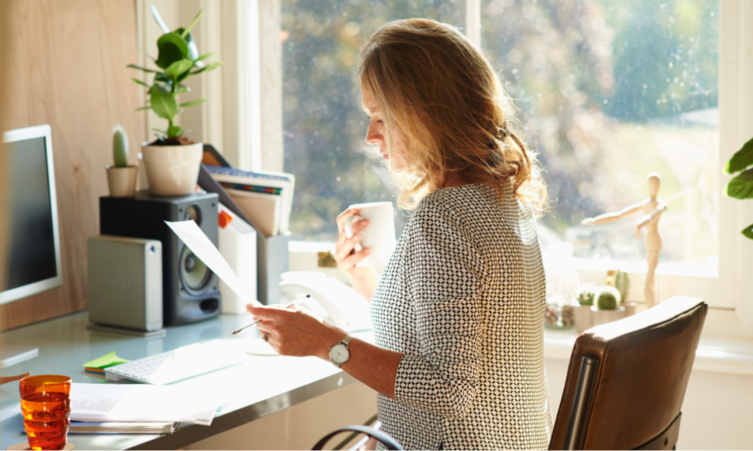 Woman working at home: Do you work from home? Home business coverage would be beneficial to you